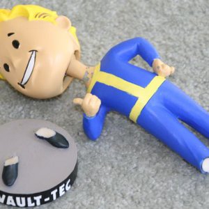 Broken Vault Boy Bobblehead